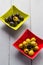 Colorful fruits olives bowls wooden table