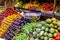 colorful fruits and vegetables in blocks with an scale on farmers market to sell fuits