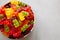 Colorful Fruity Gummy Bears in a Bowl, top view. Copy space