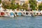 Colorful garages for boats in the harbor at Portocolom.