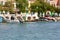 Colorful garages for boats in the harbor at Portocolom.