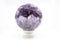 Colorful geode of amethyst on white background
