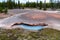 Colorful geothermal feature at the Artists Paint Pots in Yellowstone National Park