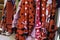 Colorful gipsy flamenco dresses on rack hanged in Spain market