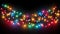 Colorful glass bulbs. Vibrant string of multi-colored Christmas lights on dark background