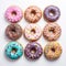 Colorful Glazed Doughnuts With Sprinkles On White Background