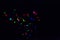 Colorful, glowing Balloons Flying in the Dark Night Sky