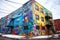 colorful graffiti-covered urban loft building