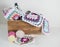 Colorful granny sqaures with woolen balls and crochet hook in wooden box