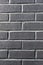 Colorful gray brick wall