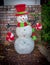 Colorful Green and Red Dressed Snowman