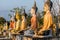 A colorful group of Buddha statues at the Buddhist Cemetery.