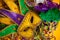 Colorful group of Mardi Gras or venetian mask or costumes on a y