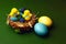 Colorful gypsum easter eggs on green background with basket and chicken toys