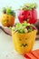 Colorful Halloween food with stuffed peppers