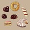 Colorful hand drawn set of different yummy sweets. Bun, cake, macaroon, biscuit on isolated background. Doodle.