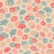 Colorful hand drawn vector lilies silhouettes seamless pattern in retro style on beige background