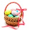 Colorful handmade easter eggs in the basket isolated