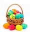 Colorful handmade easter eggs in the basket isolated on a white