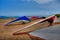 Colorful hang gliding wings lined up on top of a cliff at Fort F