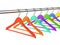 Colorful hangers on clothes rail