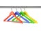 Colorful hangers on clothes rail