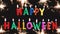 Colorful Happy Halloween candle text with sparkler fireworks, on black background