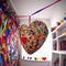 Colorful Heart-Shaped Pinata on White Wall