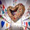 Colorful Heart-Shaped Pinata on White Wall