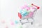 Colorful heart in shopping cart, love colorful foam heart.