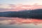 Colorful hills and lake waters in evening light