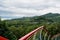 Colorful hillside steel railing in cloudy summer,Danjing Mountain