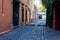 Colorful Hispanic houses in empty alley from Mexico City