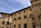 Colorful historic streets of Florence, Italy. Narrow old street, building's facade, brick walls.