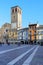 colorful historical buildings and cathedral of lodi city in vittoria square in italy