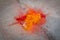 Colorful holy powder lies on the street  in India