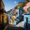 Colorful homes on a hillside with stairs leading to the ocean