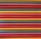 Colorful horizontal sticks as background.