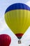 A Colorful Hot Air Balloon Lifting Into The Sky