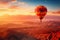 Colorful hot air balloon over desert mountains at sunset