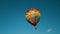 A colorful hot air balloon soaring through the blue sky