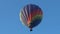 Colorful hot air balloon taking off