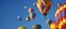 colorful hot air balloons. Colorful hot air balloons flying. A colorful hot air balloon festival, with balloons ascending into a