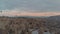 Colorful Hot Air Balloons over the snowy fairy chimneys at sunrise in Cappadocia