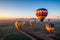 Colorful Hot Air Balloons Take Flight at Sunrise