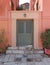 Colorful house grey door at Plaka picturesque neighborhood, Athens Greece