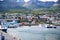 Colorful houses, boats on sea and mountains, Ushuaia, Capaital of Tierra del Fuego, Patagonia, Argentina