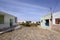 Colorful houses at the end of a paved street in Cape Verde