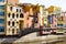 Colorful houses of Girona in center of city en embankment of Onyar River