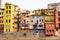 Colorful houses of Girona in center of city en embankment of Onyar River